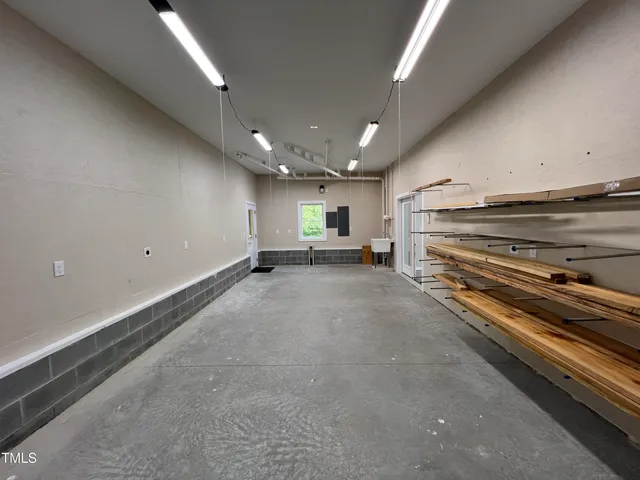 a view of a hall with kitchen