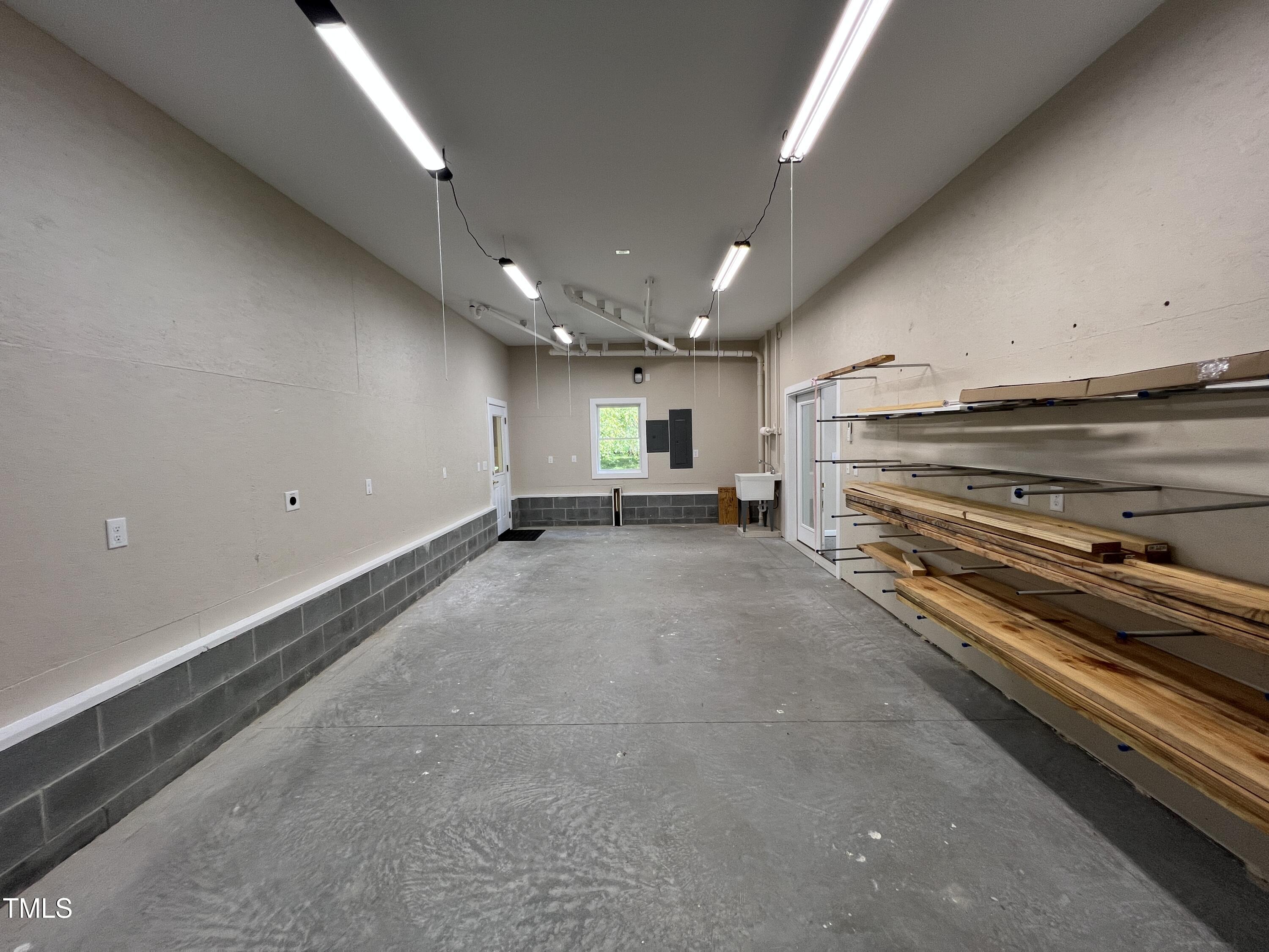 1208 Goodwin Road Apex, NC 27523 - Photo 42 of 42 a view of a hall with kitchen