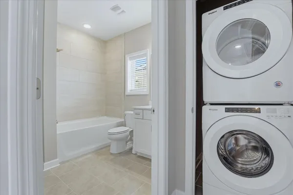 a bathroom with a toilet and a sink