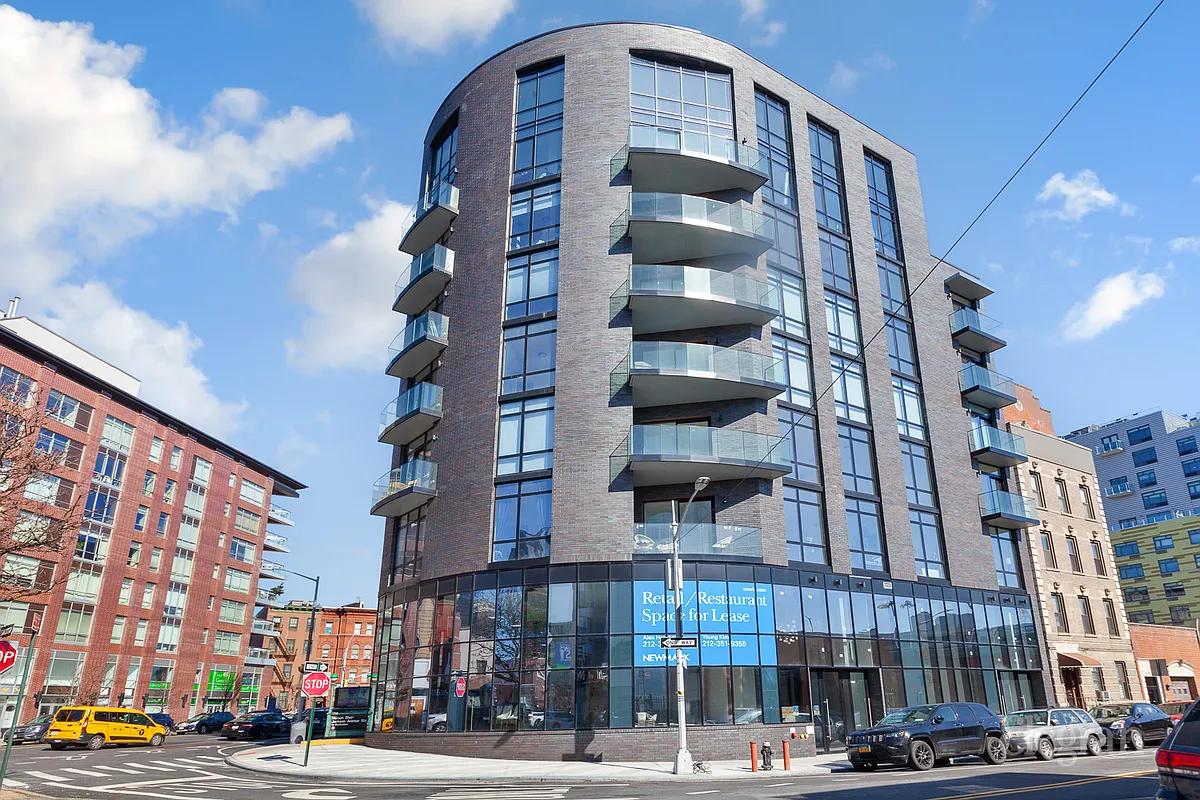 10-64 Jackson Avenue, Unit 4B Queens, NY 11101 - Photo 9 of 10 a front view of a building