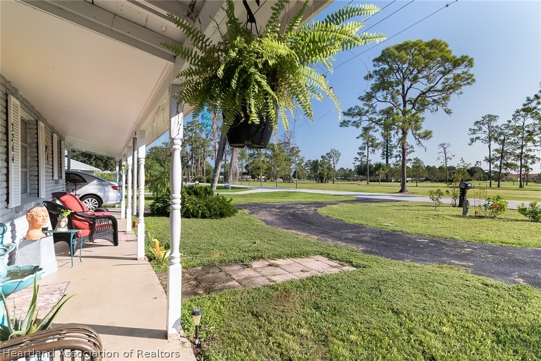 3264 Golfview Road Sebring, FL 33875 - Photo 24 of 27 a view of a park with swings and slides
