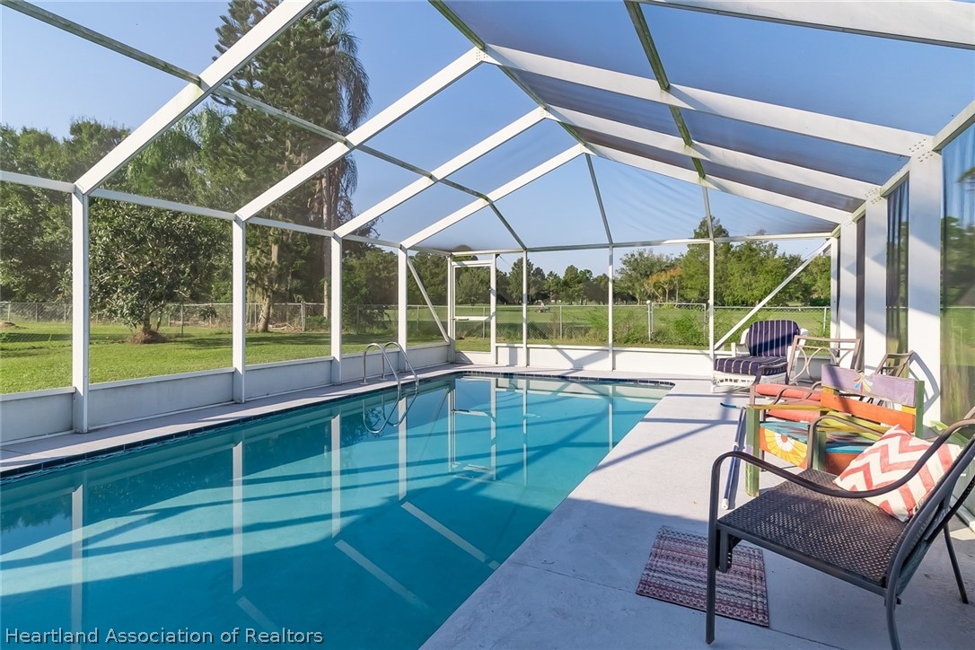 3264 Golfview Road Sebring, FL 33875 - Photo 3 of 27 a view of a room with windows and table
