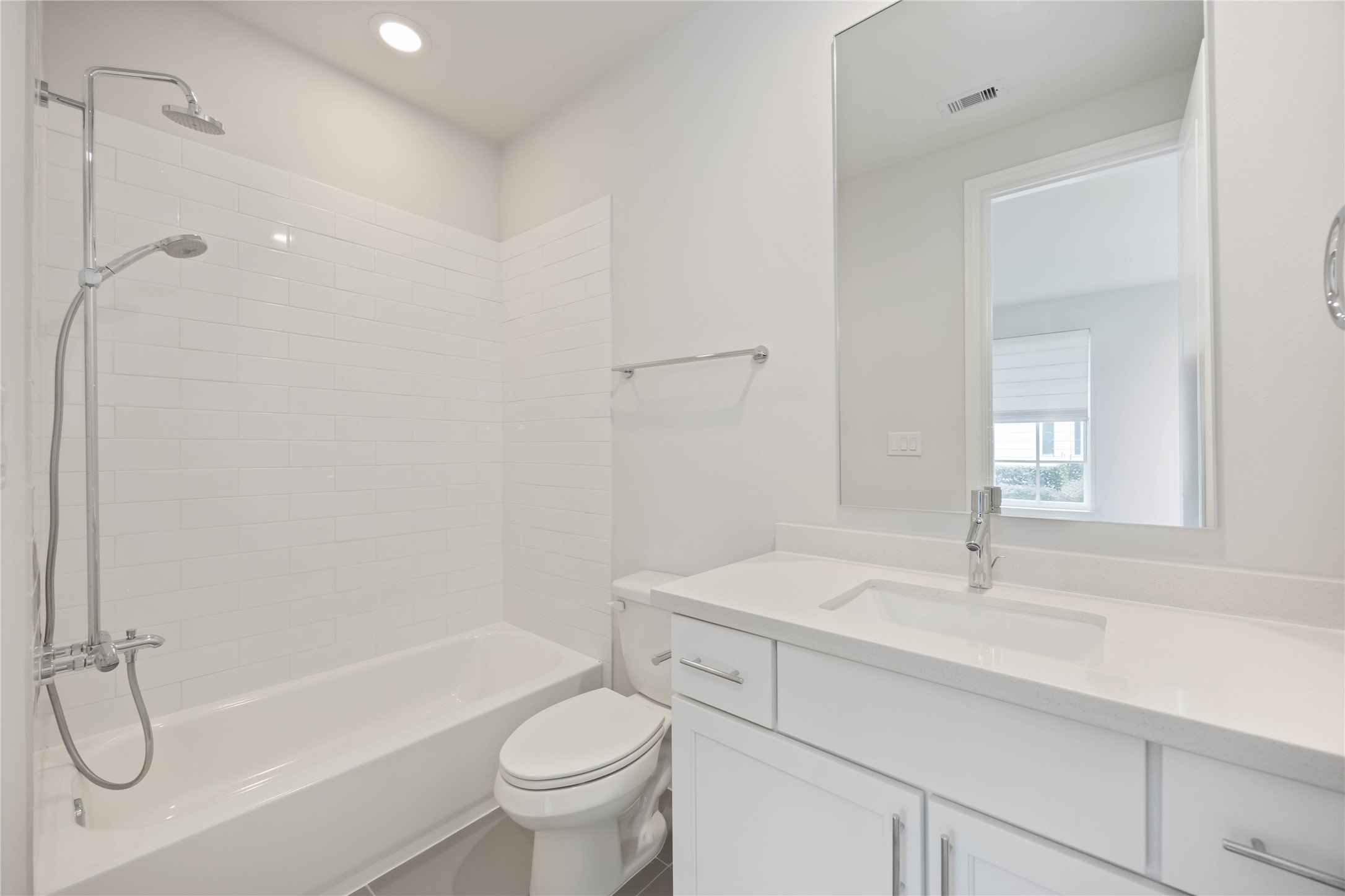 610 Delmar Street Houston, TX 77023 - Photo 12 of 27 a bathroom with a sink a toilet and shower