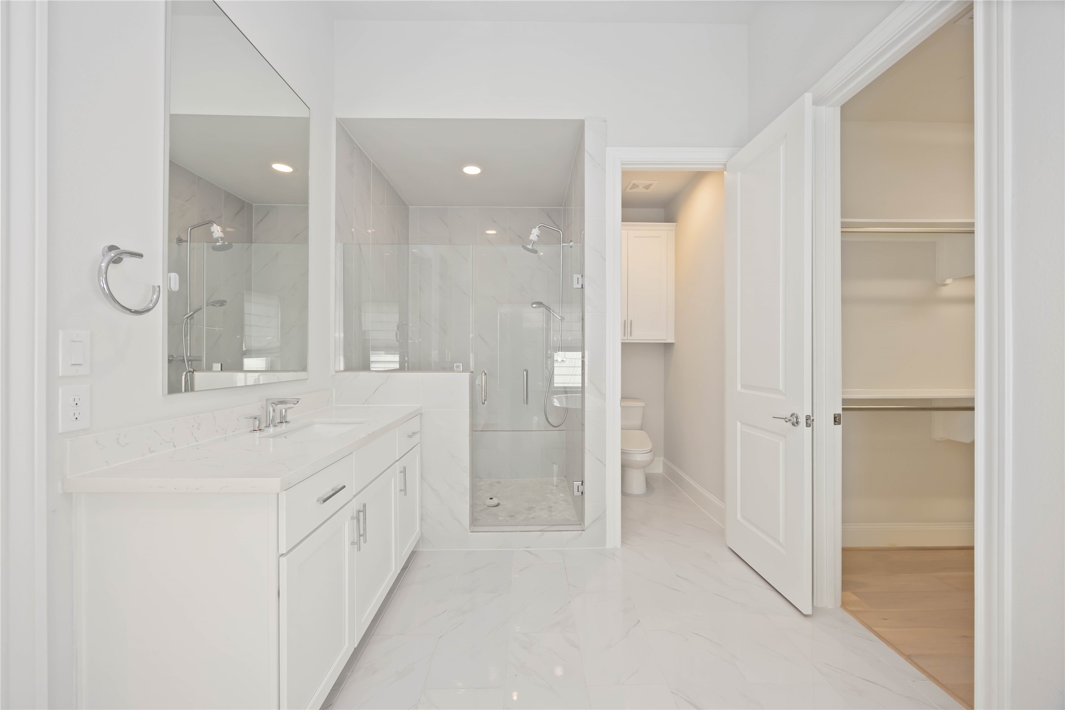 610 Delmar Street Houston, TX 77023 - Photo 18 of 27 a bathroom with a double vanity sink mirror and shower