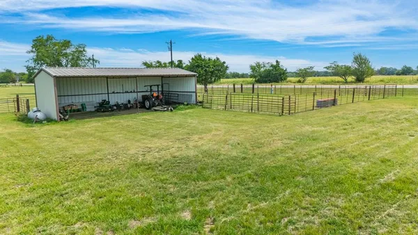 a view of a lake with a big yard