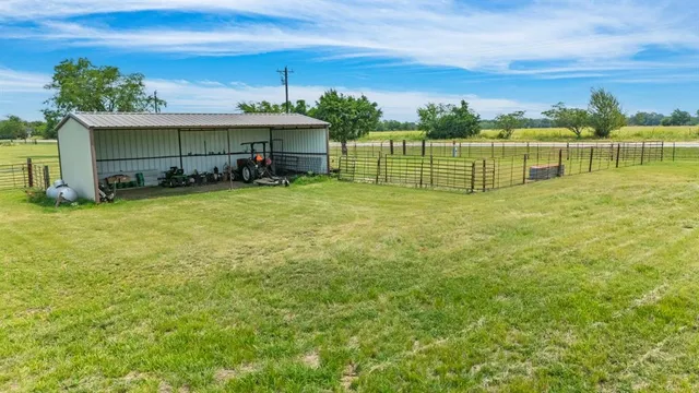 a view of a lake with a big yard
