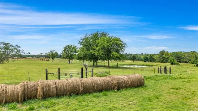 a view of a lake with a yard