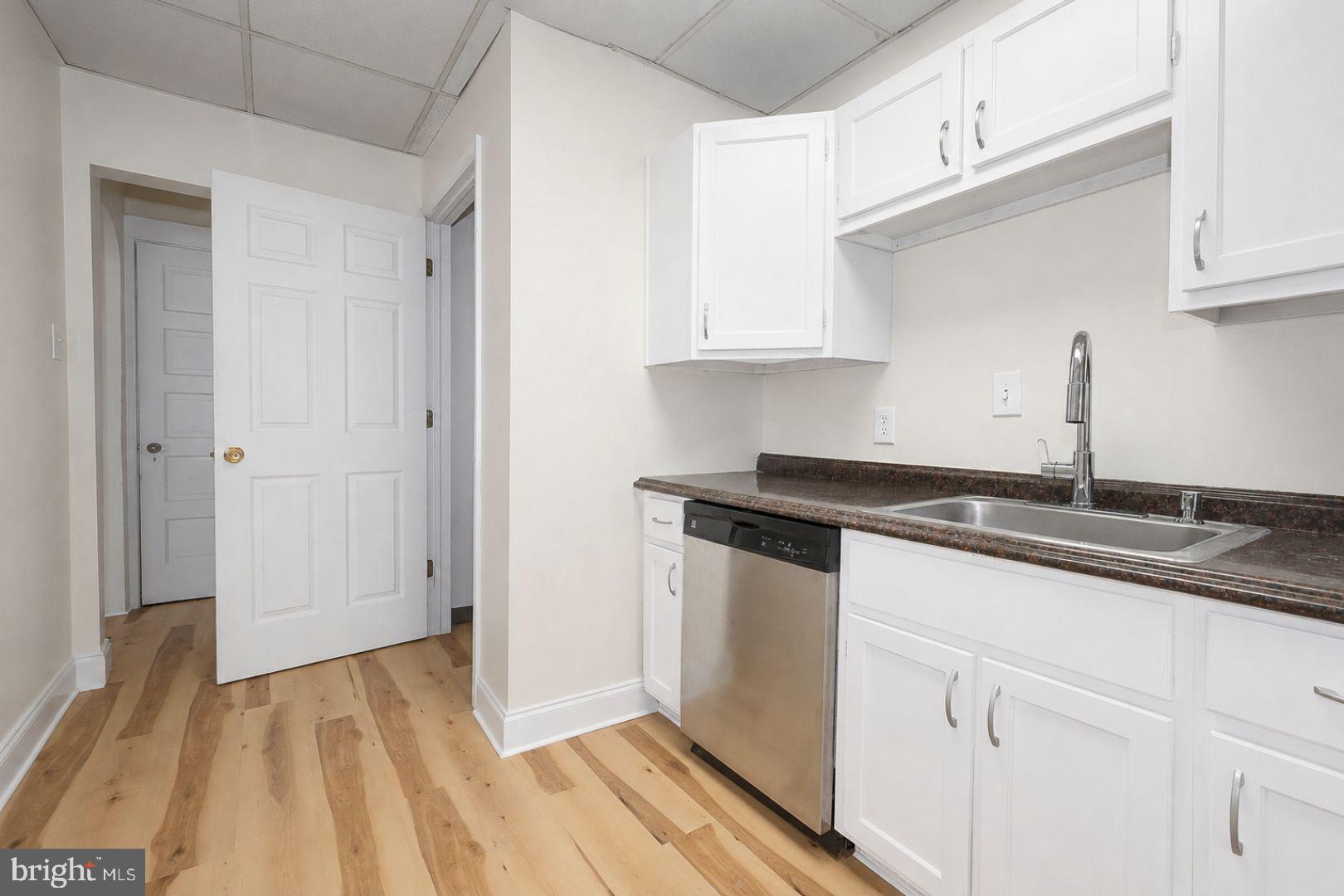 1 South Valley Road, Unit 202 Paoli, PA 19301 - Photo 6 of 25 Door to Laundry