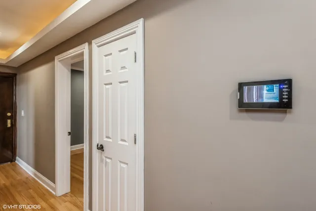 a view of a hallway with closet