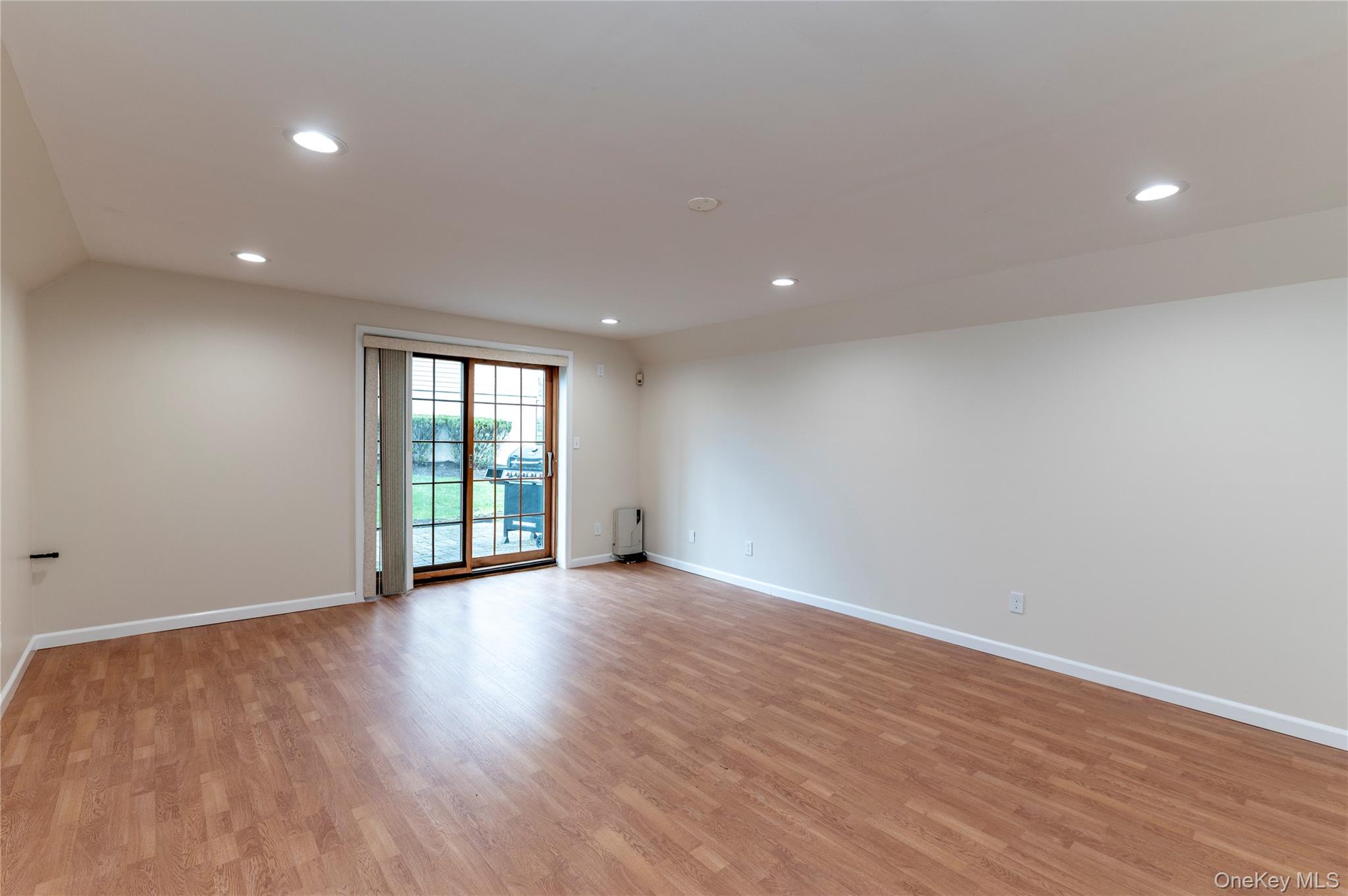 126 North Rte 303, Unit 2 Congers, NY 10920 - Photo 16 of 21 a view of an empty room with wooden floor and a window