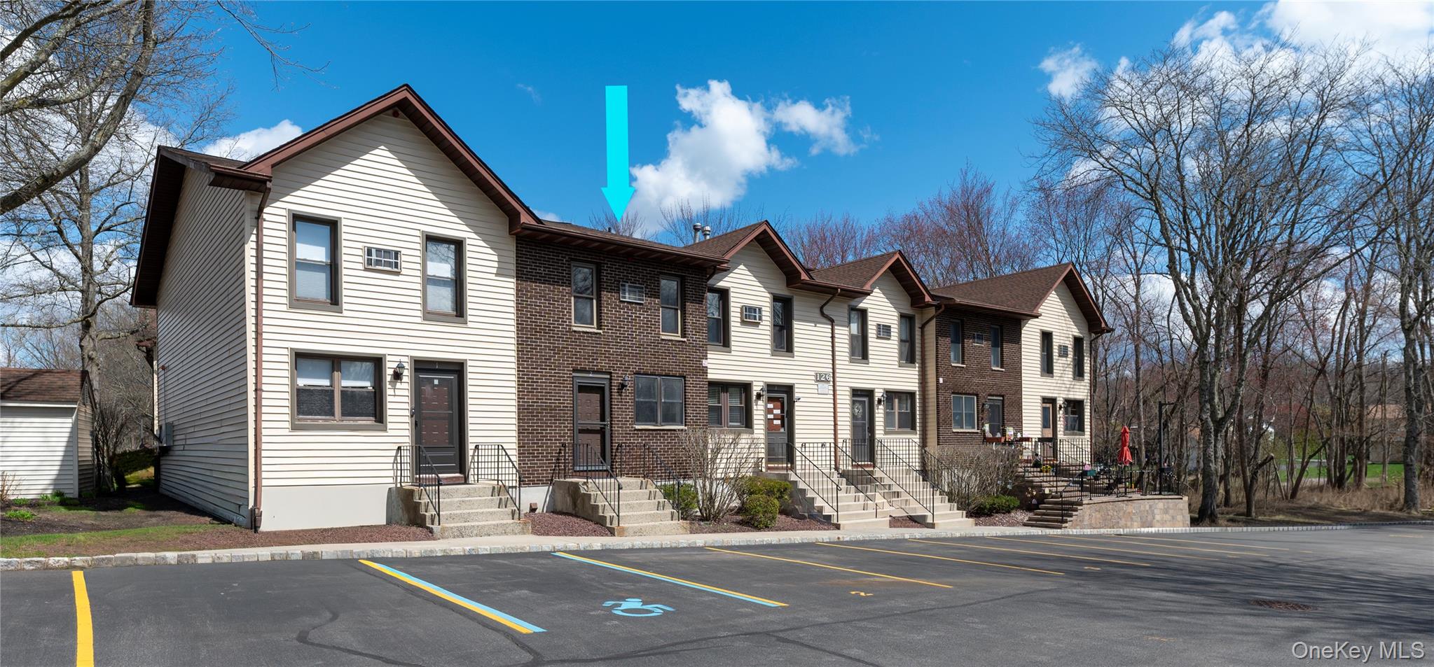 126 North Rte 303, Unit 2 Congers, NY 10920 - Photo 2 of 21 a front view of a house with a yard