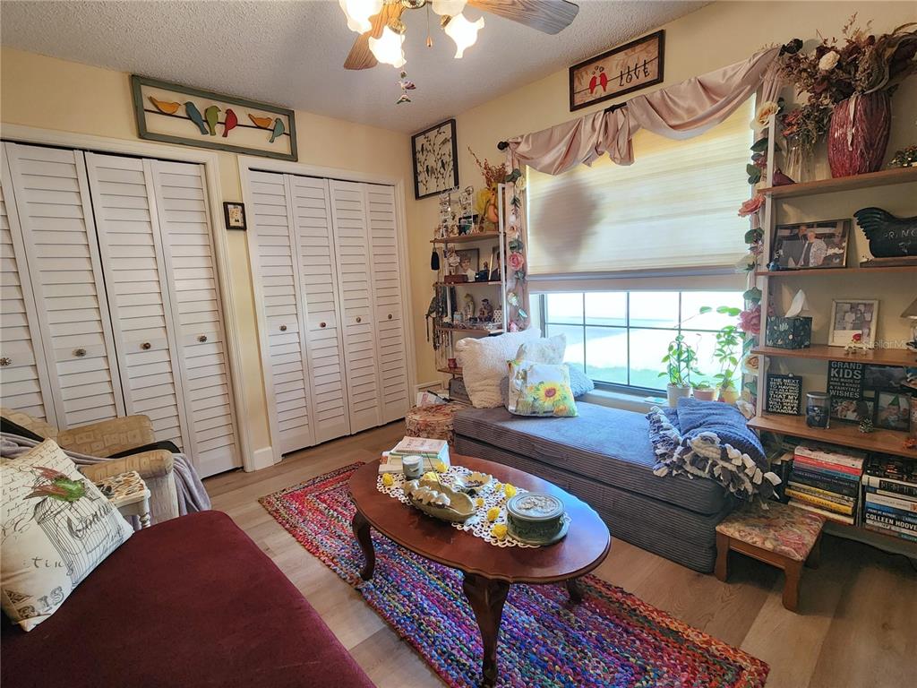 1701 Southeast 24th Road, Unit 1601 Ocala, FL 34471 - Photo 17 of 30 a living room with furniture and a window