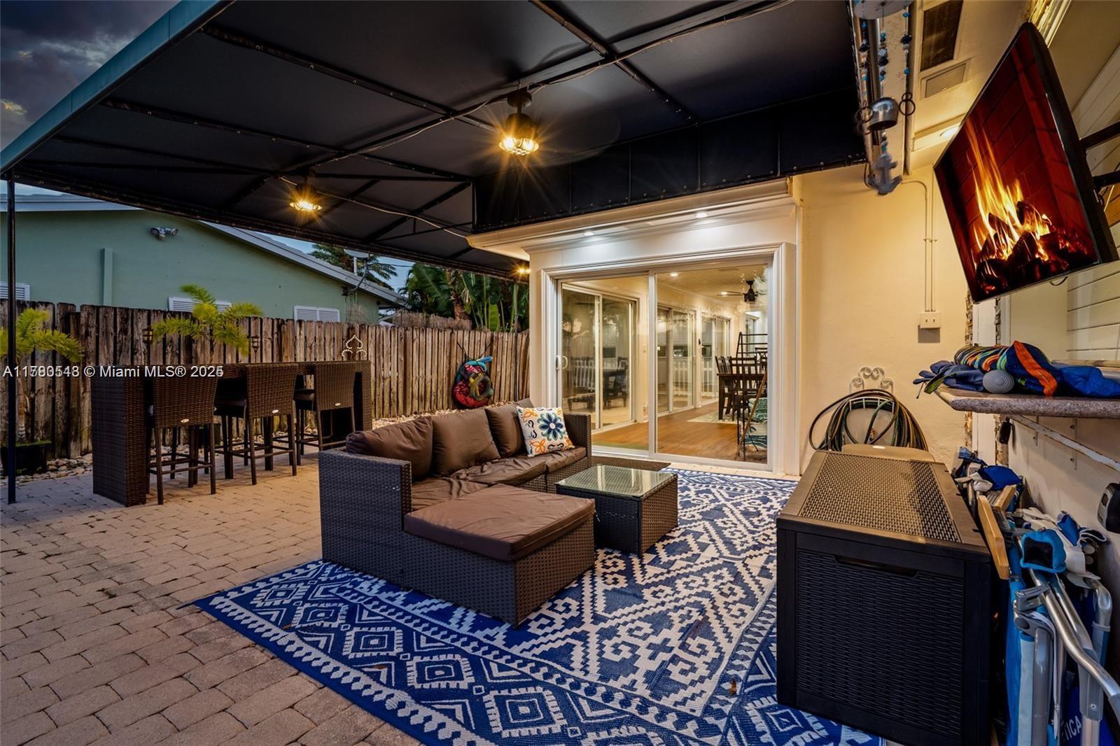 2231 Northeast 38th Street Lighthouse Point, FL 33064 - Photo 16 of 18 a outdoor living space with furniture