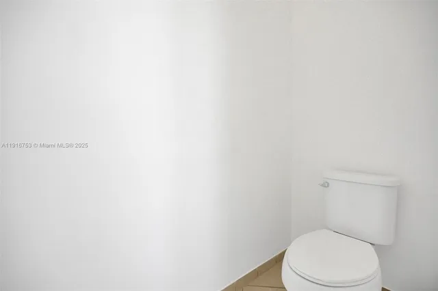 a bathroom with a double vanity sink and mirror