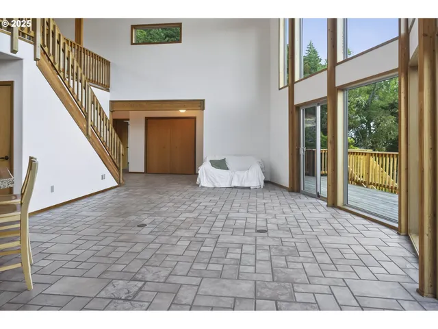 a view of a porch with wooden floor