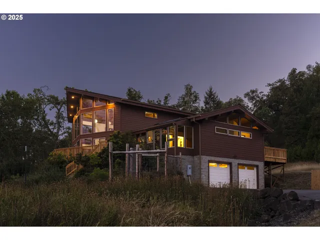 a view of a yard in front of a house with a yard