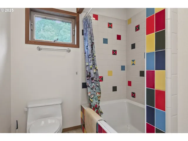 a view of a room with a bathroom