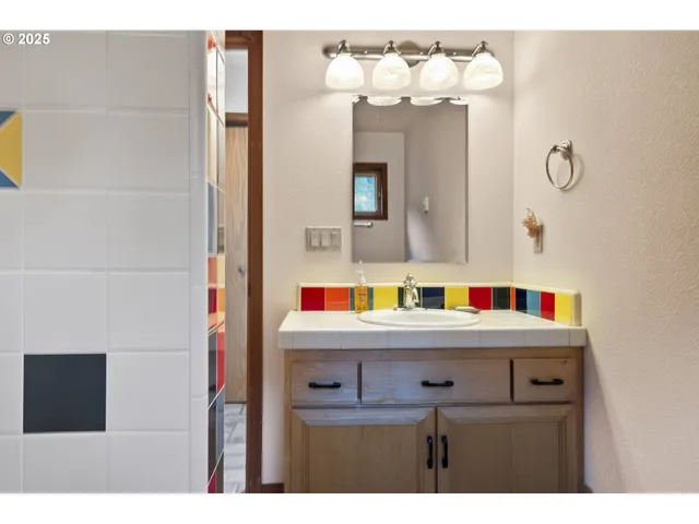 a bathroom with a sink a toilet and a bathtub