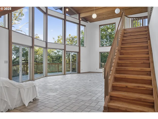 a house view with outdoor space and garden