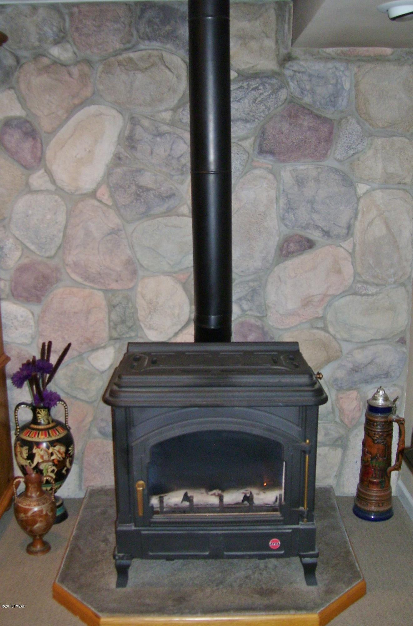 261 Oak Hill Road Hawley, PA 18428 - Photo 51 of 92 Family Room Free Standing Fireplace