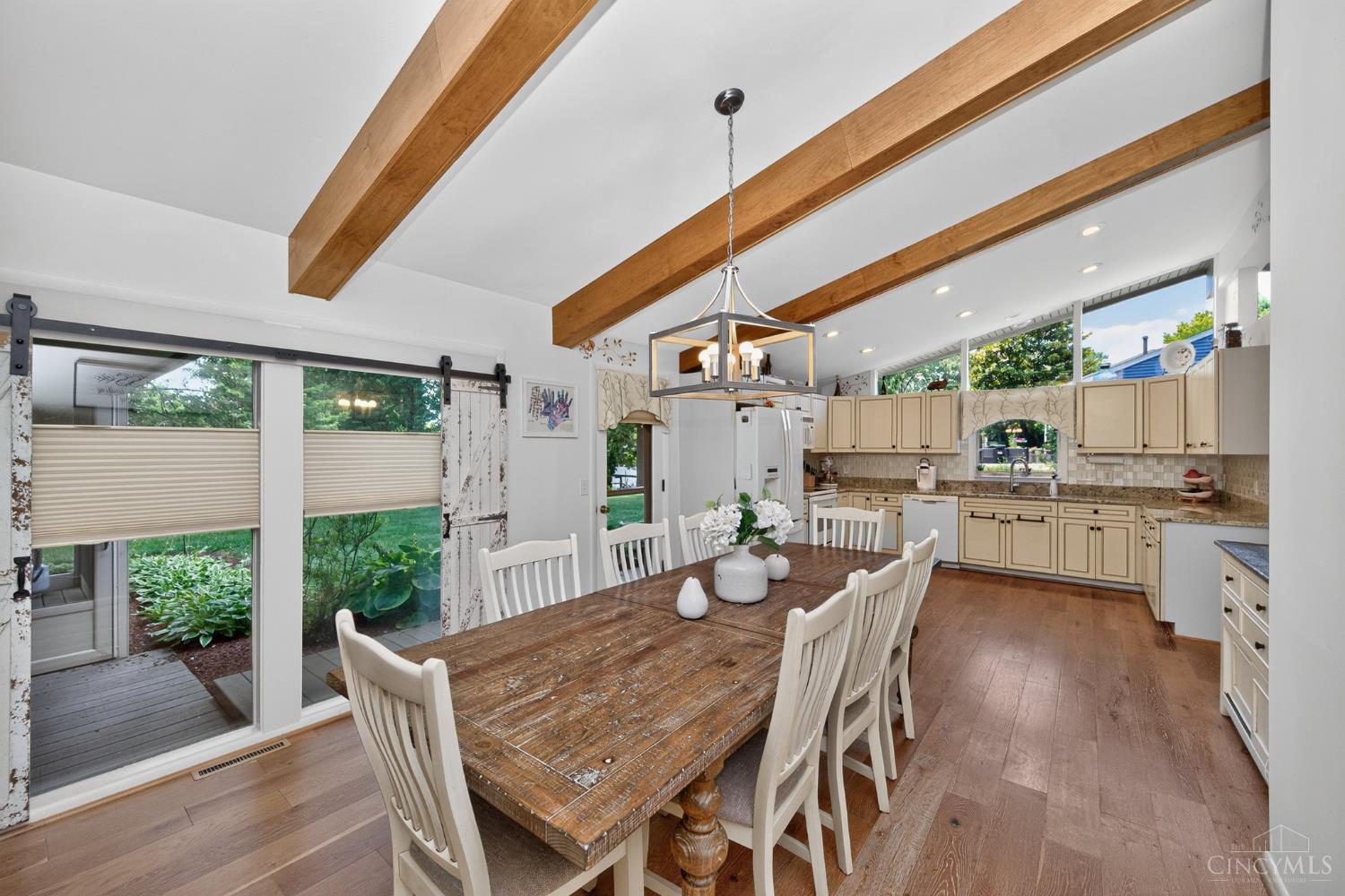 3078 Ebenezer Road Cincinnati, OH 45233 - Photo 11 of 51 Beautiful wooden flooring extends from the dining room to the remodeled kitchen.