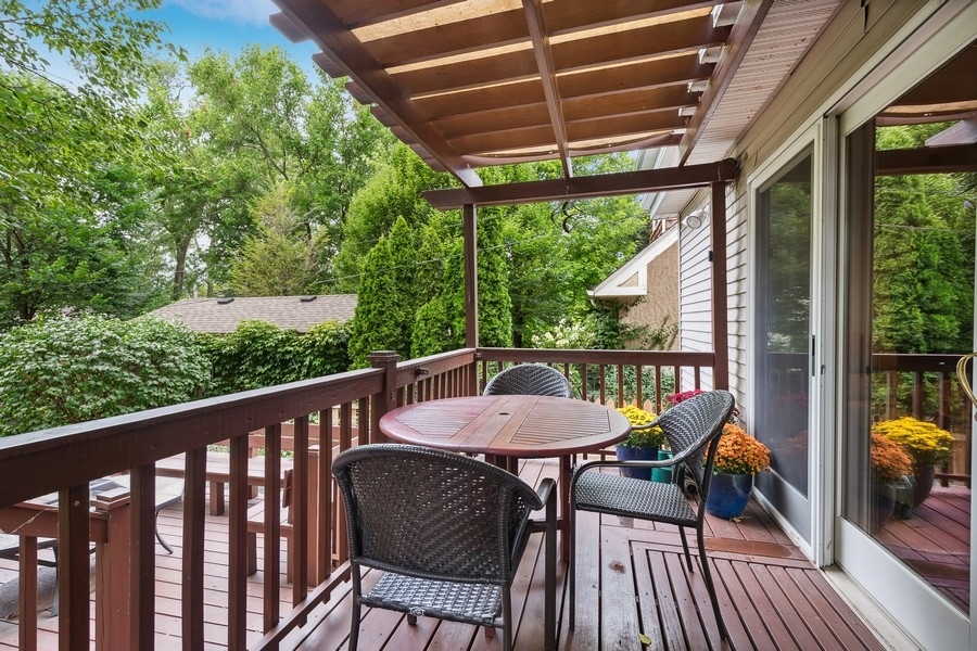 606 Barton Avenue Evanston, IL 60202 - Photo 19 of 27 a view of a dining room with furniture window and outside view