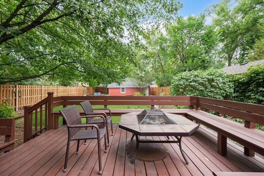606 Barton Avenue Evanston, IL 60202 - Photo 20 of 27 a view of a chairs and table on the deck