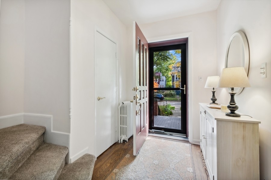 606 Barton Avenue Evanston, IL 60202 - Photo 4 of 27 a view of livingroom with furniture and front door
