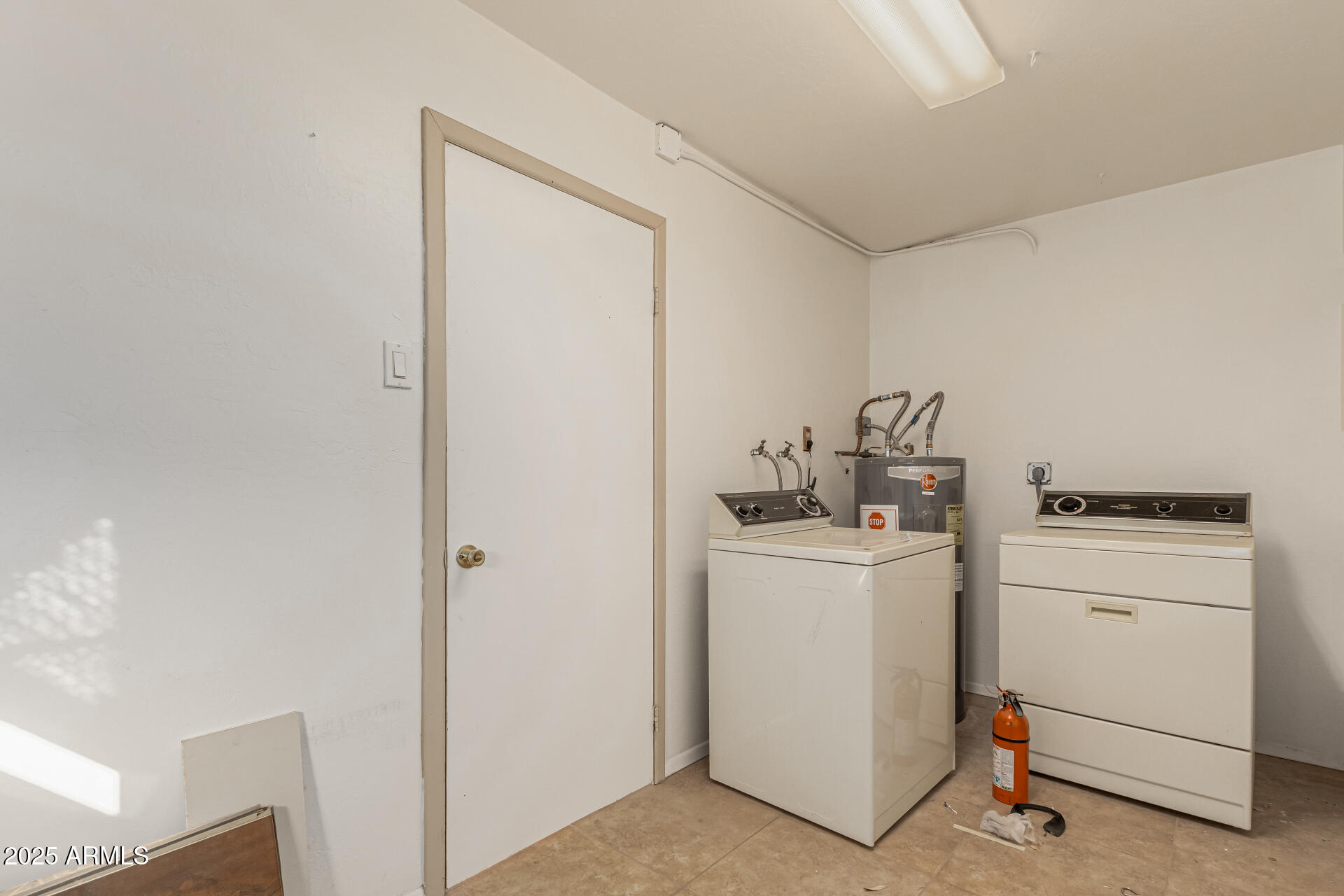 1206 South Grand Drive Apache Junction, AZ 85120 - Photo 18 of 26 a room with storage and utility