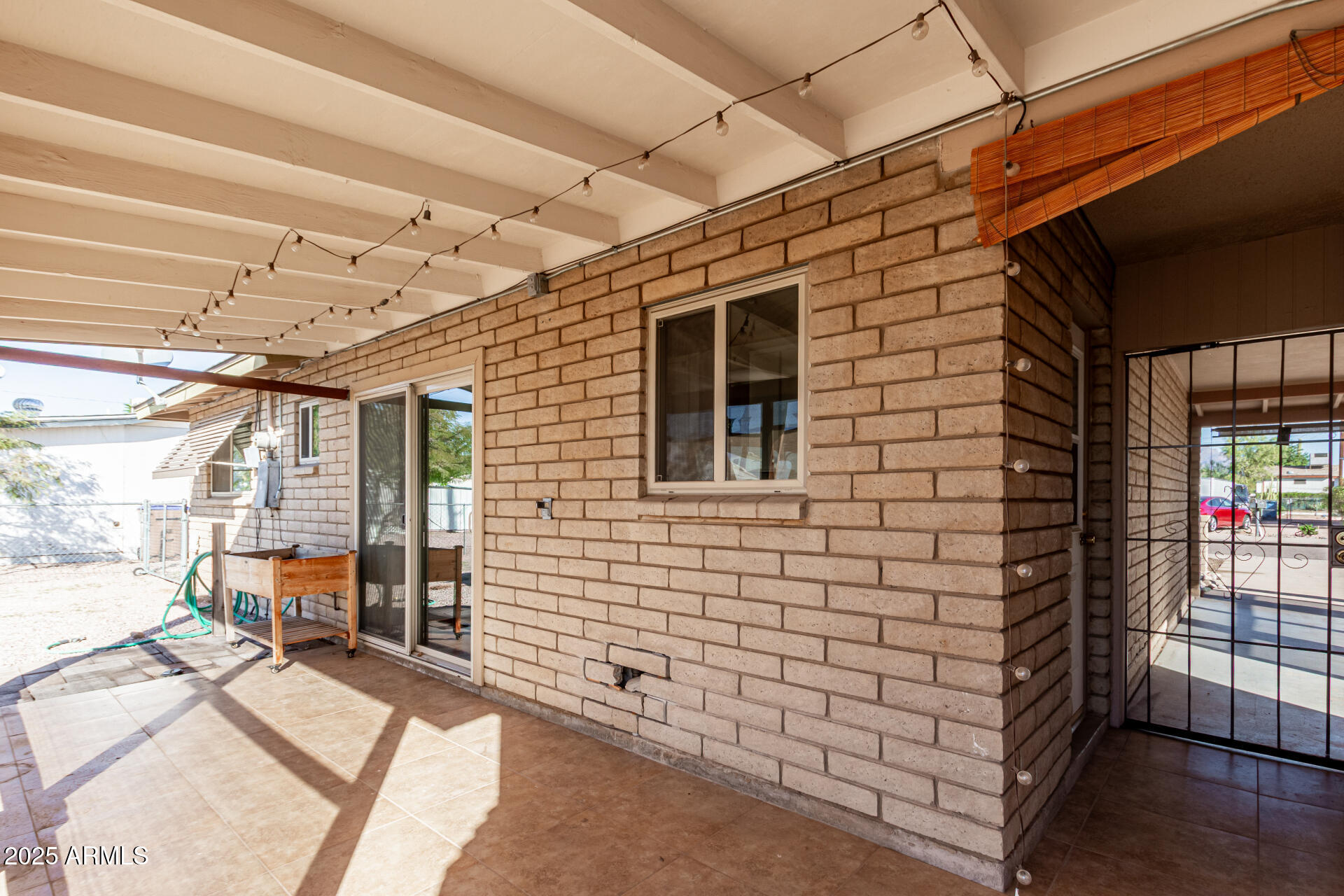 1206 South Grand Drive Apache Junction, AZ 85120 - Photo 21 of 26 a view of a porch with a patio