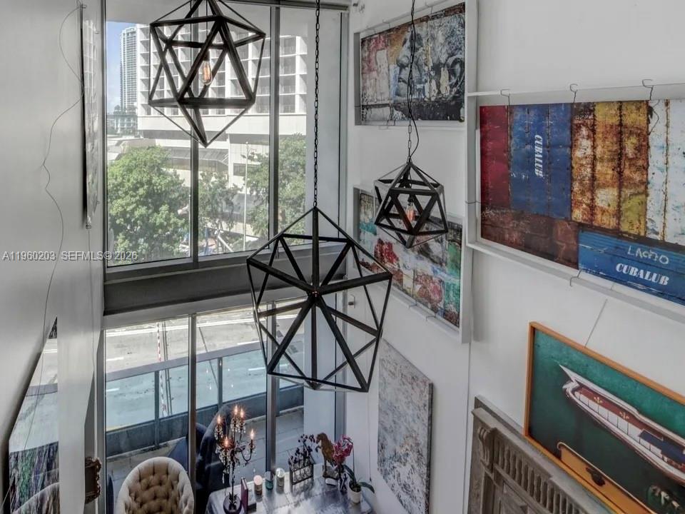 200 Biscayne Blvd Way, Unit 501 Miami, FL 33131 - Photo 13 of 15 a view of a livingroom with furniture and windows