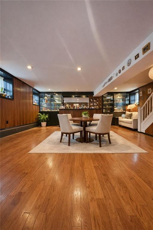 3923 Avenue R Brooklyn, NY 11234 - Photo 11 of 23 a living room with furniture and a wooden floor