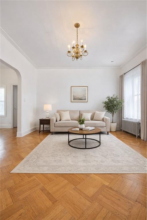 3923 Avenue R Brooklyn, NY 11234 - Photo 12 of 23 a living room with furniture and a wooden floor