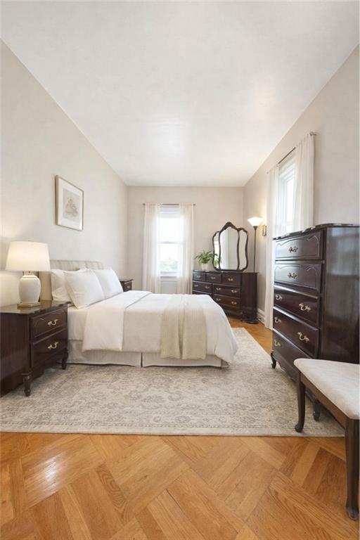 3923 Avenue R Brooklyn, NY 11234 - Photo 13 of 23 a bedroom with a bed window and dresser