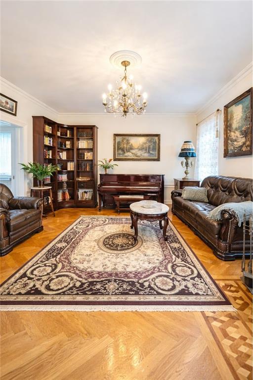 3923 Avenue R Brooklyn, NY 11234 - Photo 5 of 23 a living room with furniture or couch and a dining table