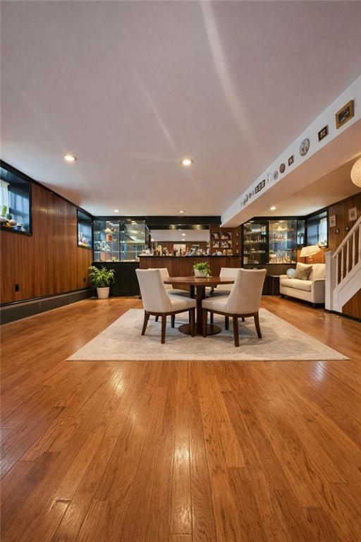 3923 Avenue R Brooklyn, NY 11234 - Photo 9 of 23 a living room with furniture and a wooden floor