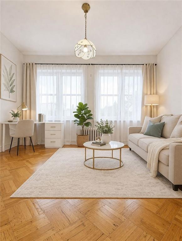 3923 Avenue R Brooklyn, NY 11234 - Photo 10 of 23 a living room with furniture and a large window