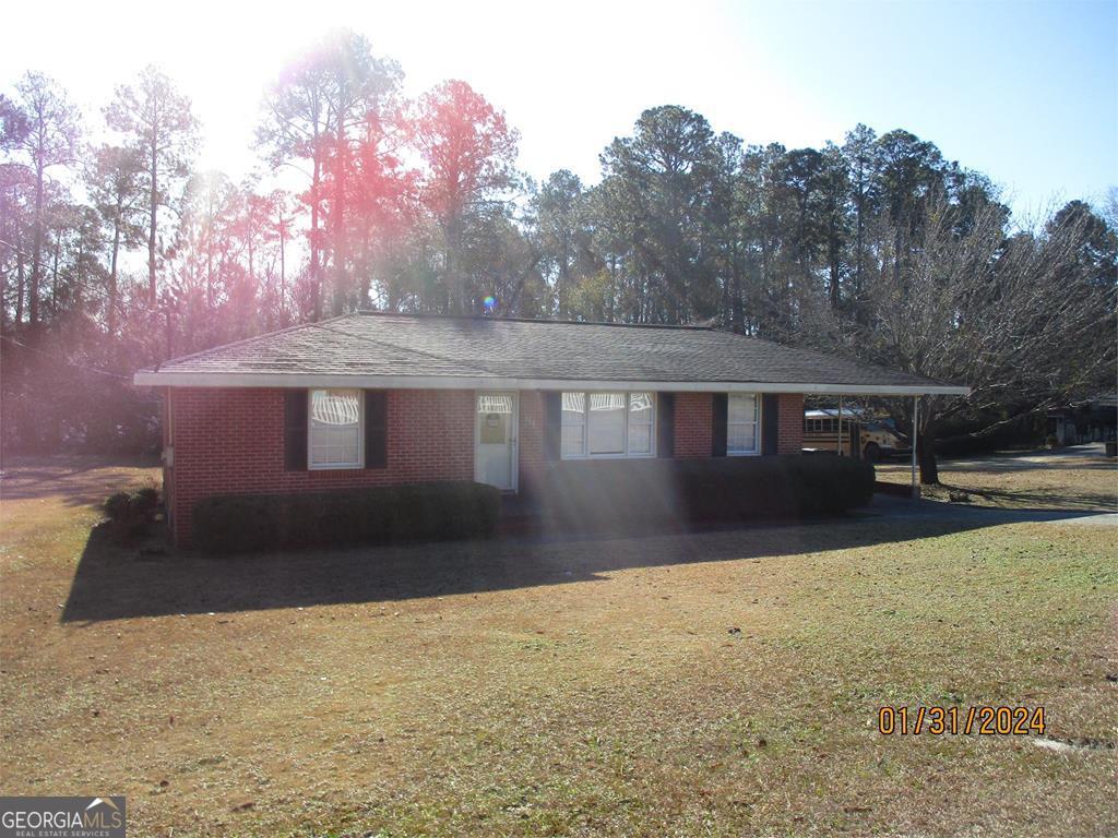 Multiple Multiple Soperton, GA 30457 - Photo 1 of 1 a front view of a house with a yard