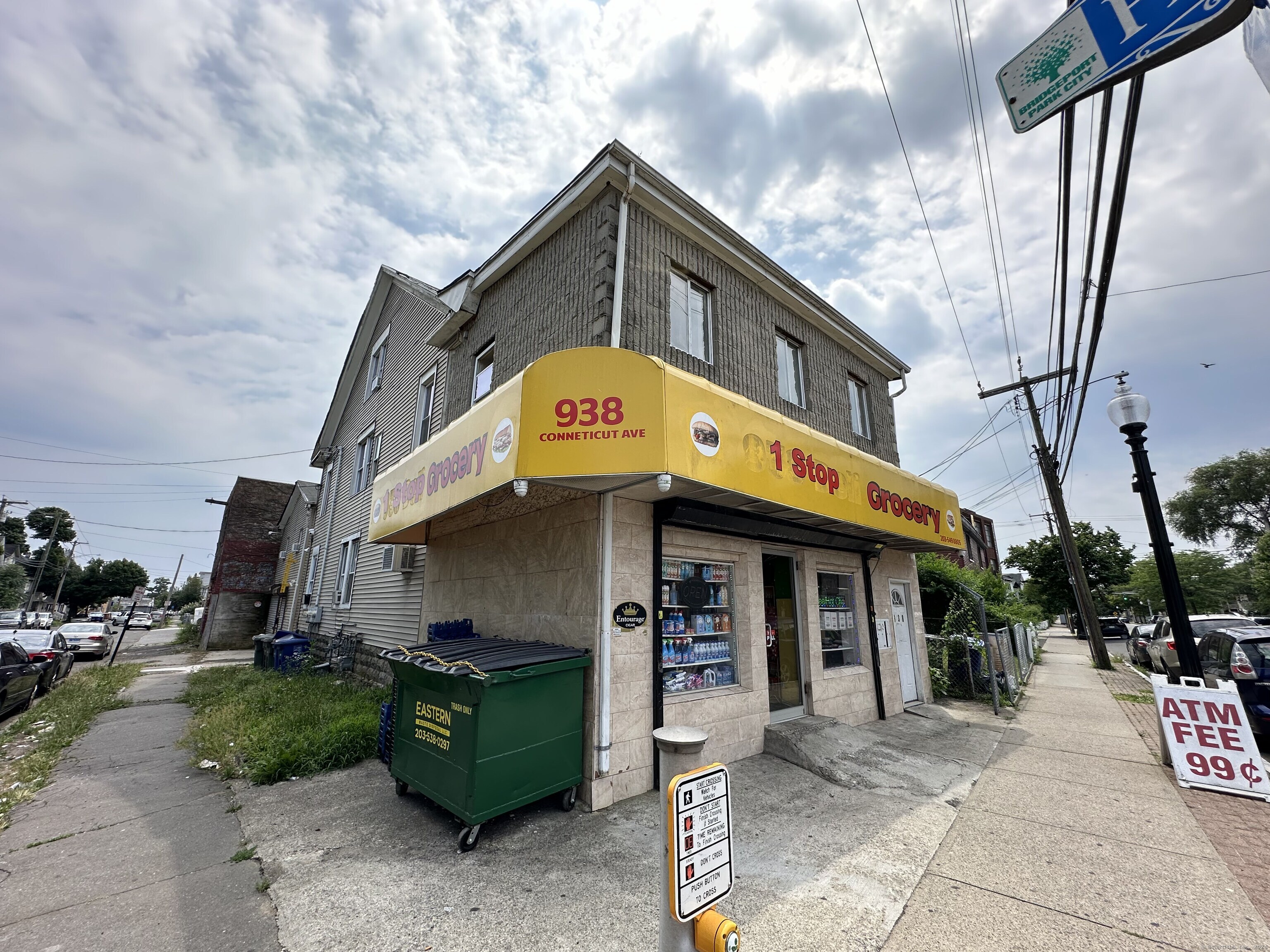 938 Connecticut Avenue, Unit 2 Bridgeport, CT 06607 - Photo 1 of 1 a front view of a building with garden