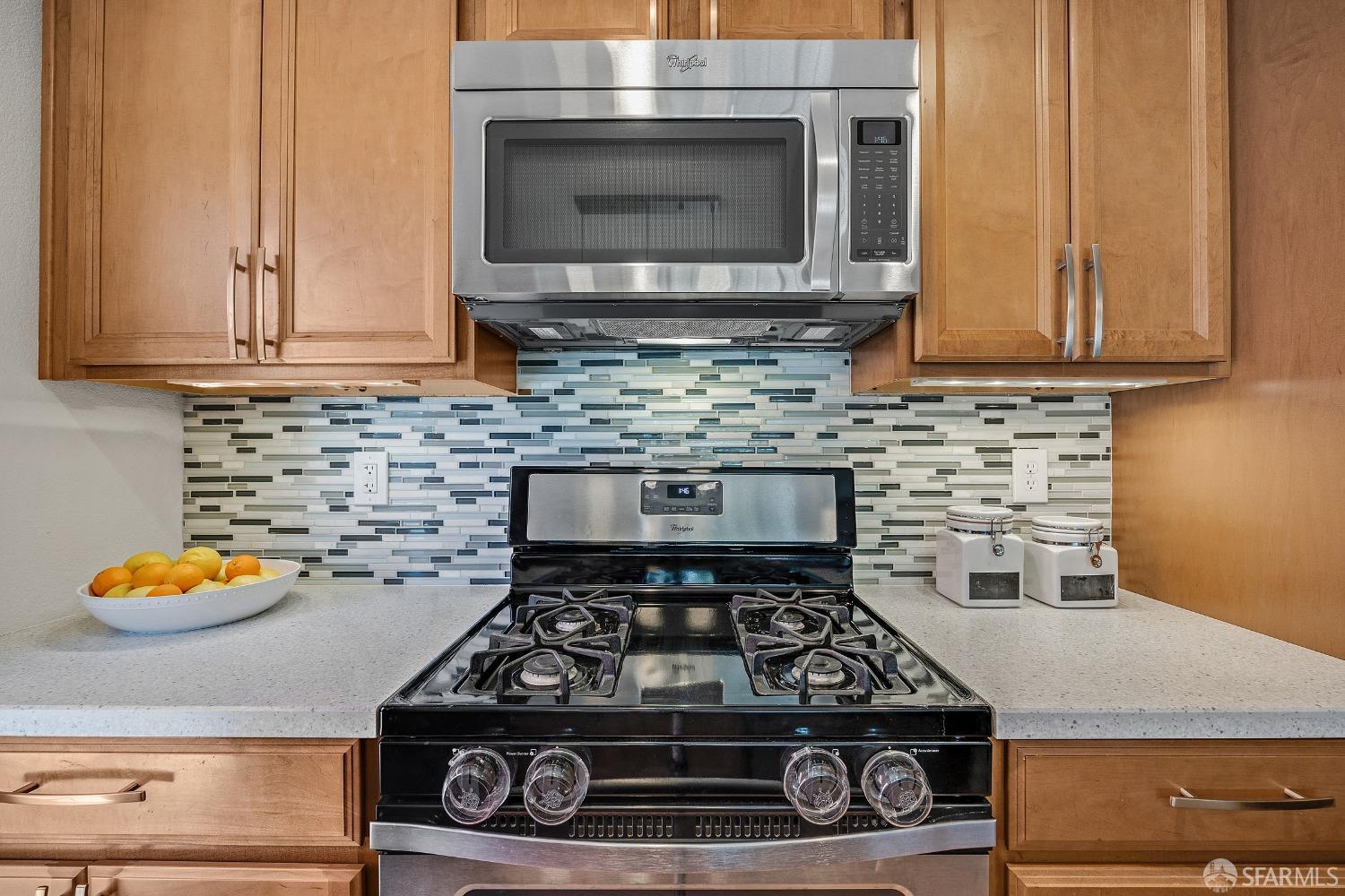 1780 Peary Way Livermore, CA 94550 - Photo 12 of 38 a kitchen with stove top oven and cabinets
