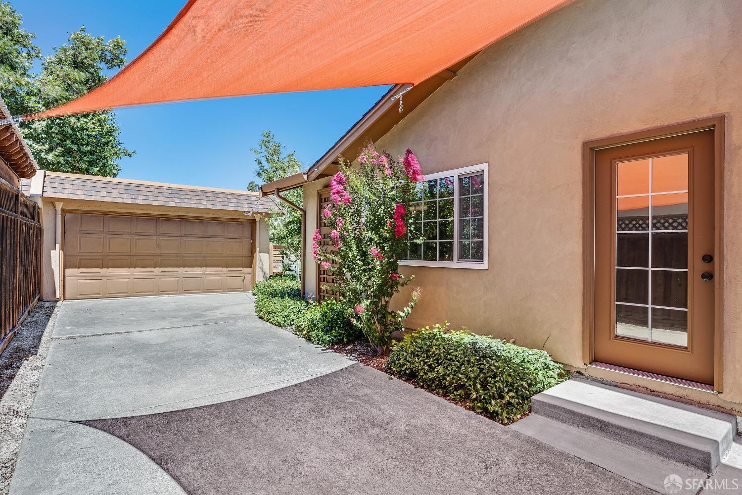 1780 Peary Way Livermore, CA 94550 - Photo 23 of 38 a front view of a house with a yard and garage