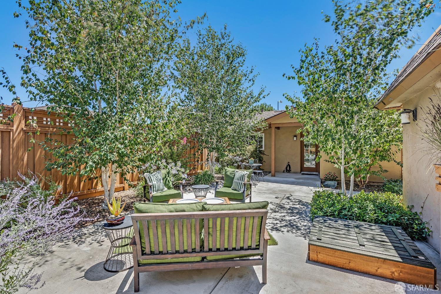 1780 Peary Way Livermore, CA 94550 - Photo 29 of 38 a view of a chair and tables in the backyard with plants