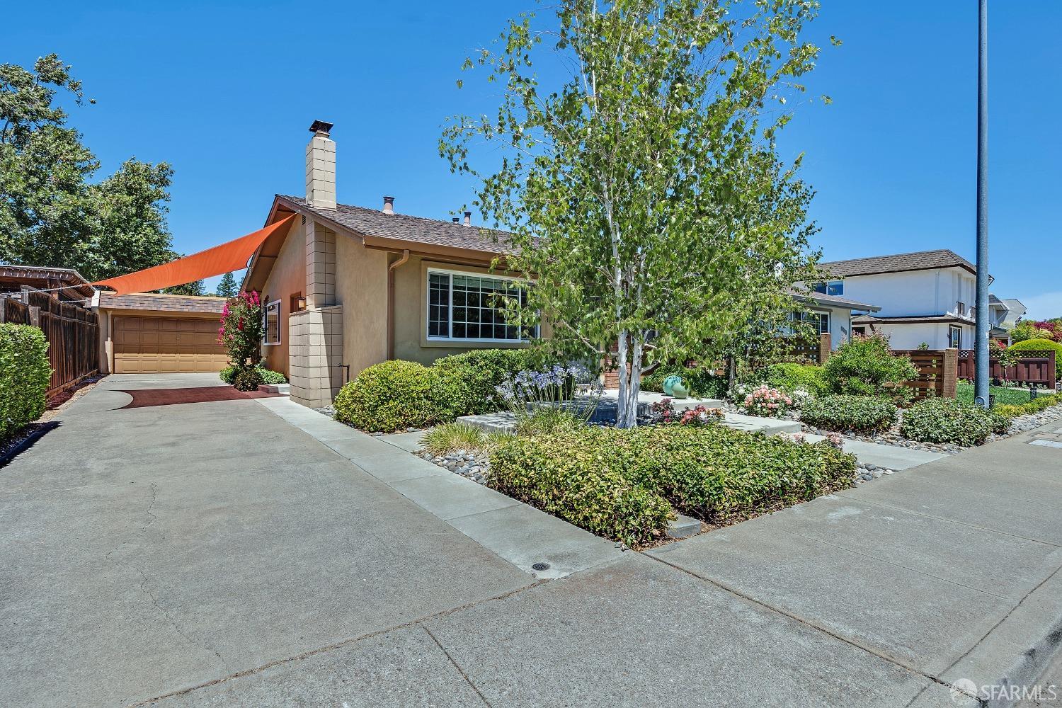 1780 Peary Way Livermore, CA 94550 - Photo 4 of 38 a front view of a house with garden