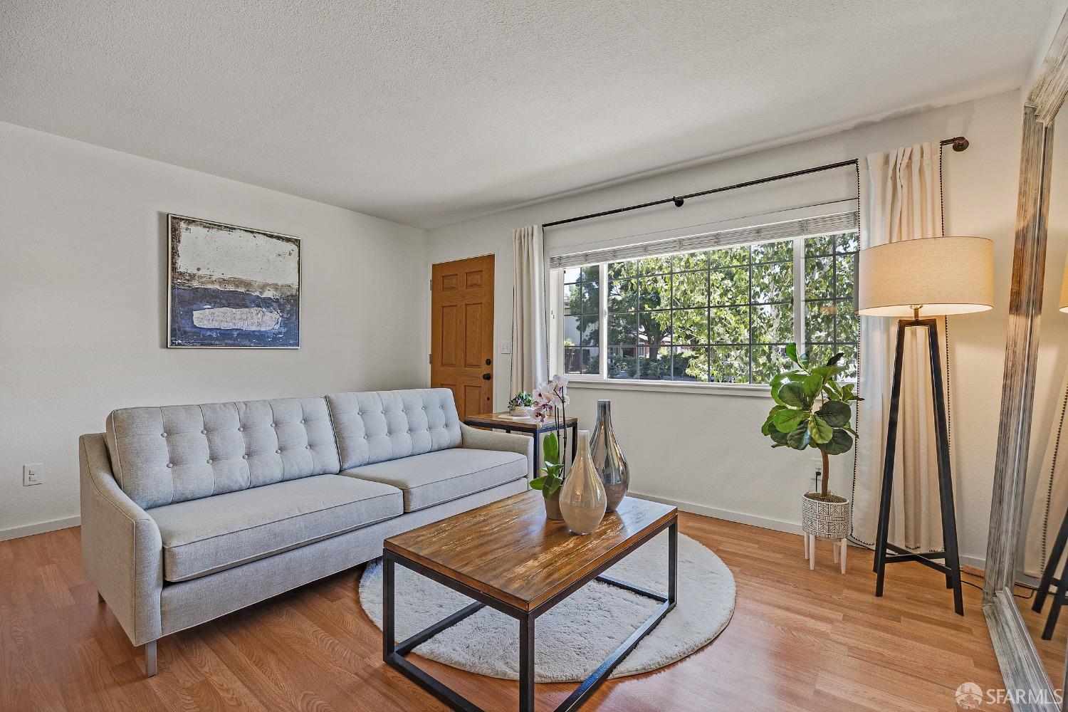1780 Peary Way Livermore, CA 94550 - Photo 7 of 38 a living room with furniture and a window