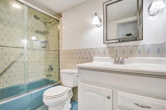 a view of a glass door and a yard