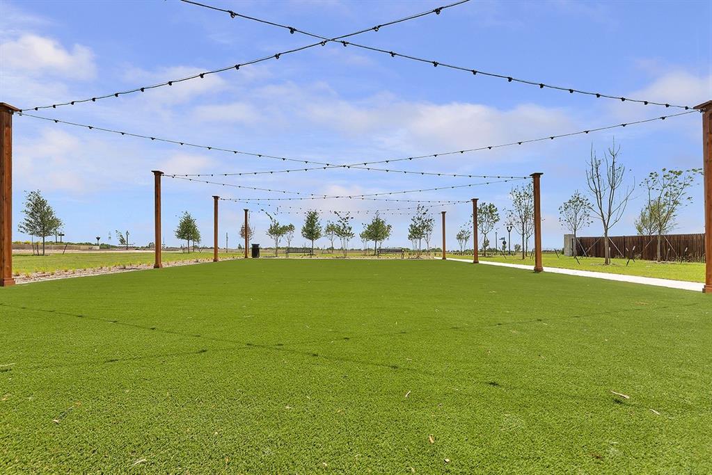 656 Blakelys Way Fate, TX 75189 - Photo 13 of 22 a view of a big room with a big yard