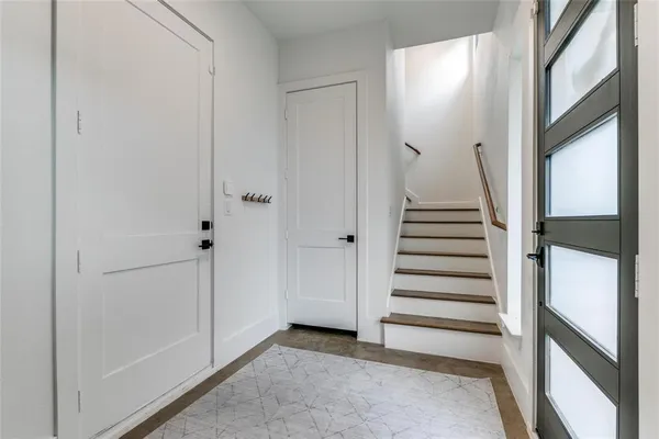 a view of entryway with stairs