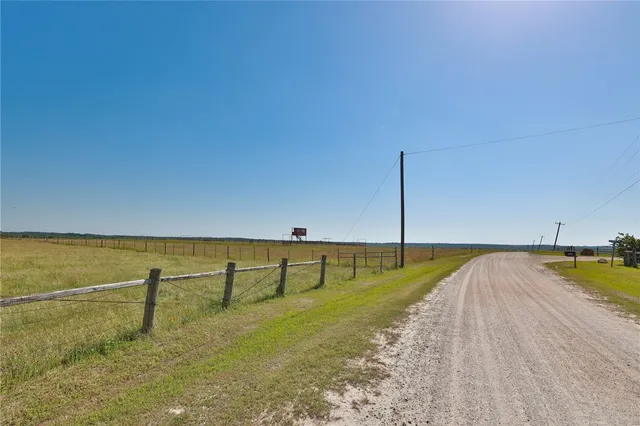 a view of a swimming pool and an outdoor space