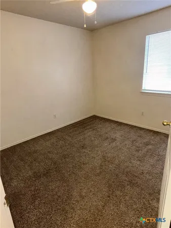 a view of a room with an empty space