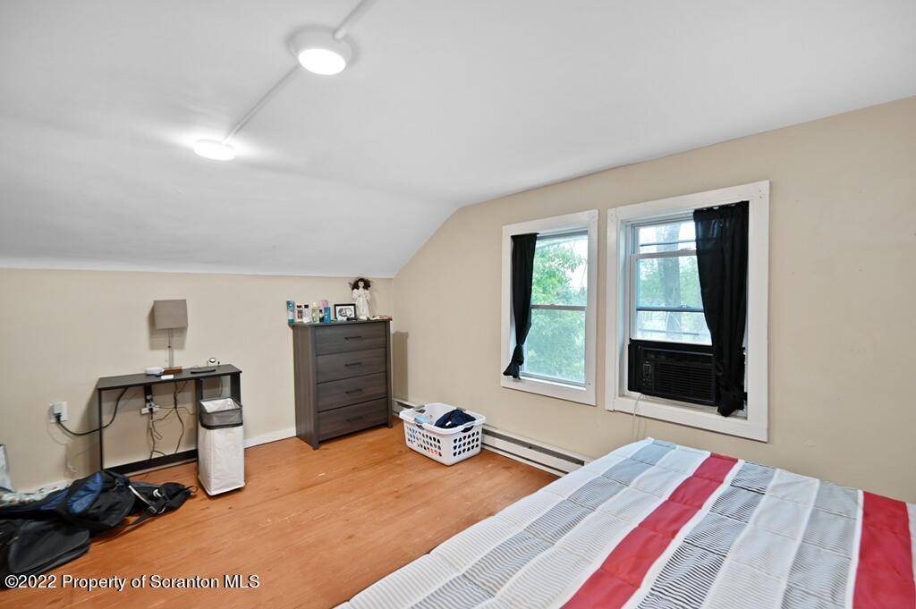 809 Cortez Road Lake Ariel, PA 18436 - Photo 32 of 43 a bedroom with furniture and a window